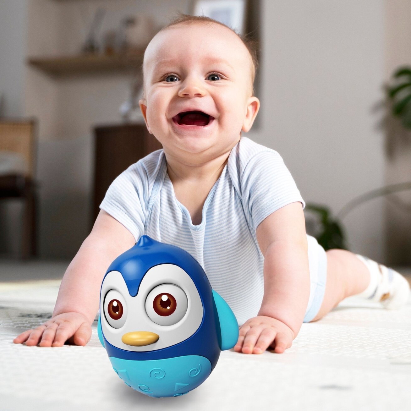 WOOPIE BABY Sensorinis pingvinukas „Wańka-wstańka“ 4