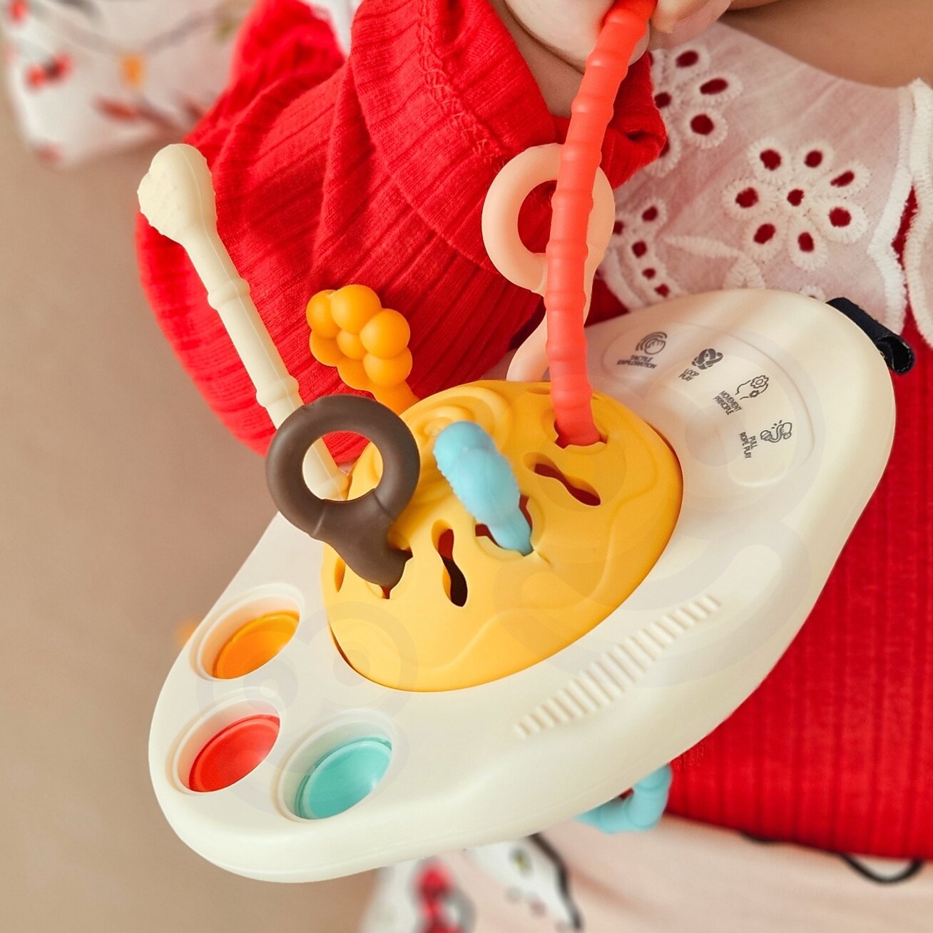 WOOPIE BABY sensorinis Montessori žaislas kramtukas barškutis daugiafunkcis UFO 4 WOOPIE BABY sensorinis Montessori žaislas kramtukas barškutis daugiafunkcis UFO 4