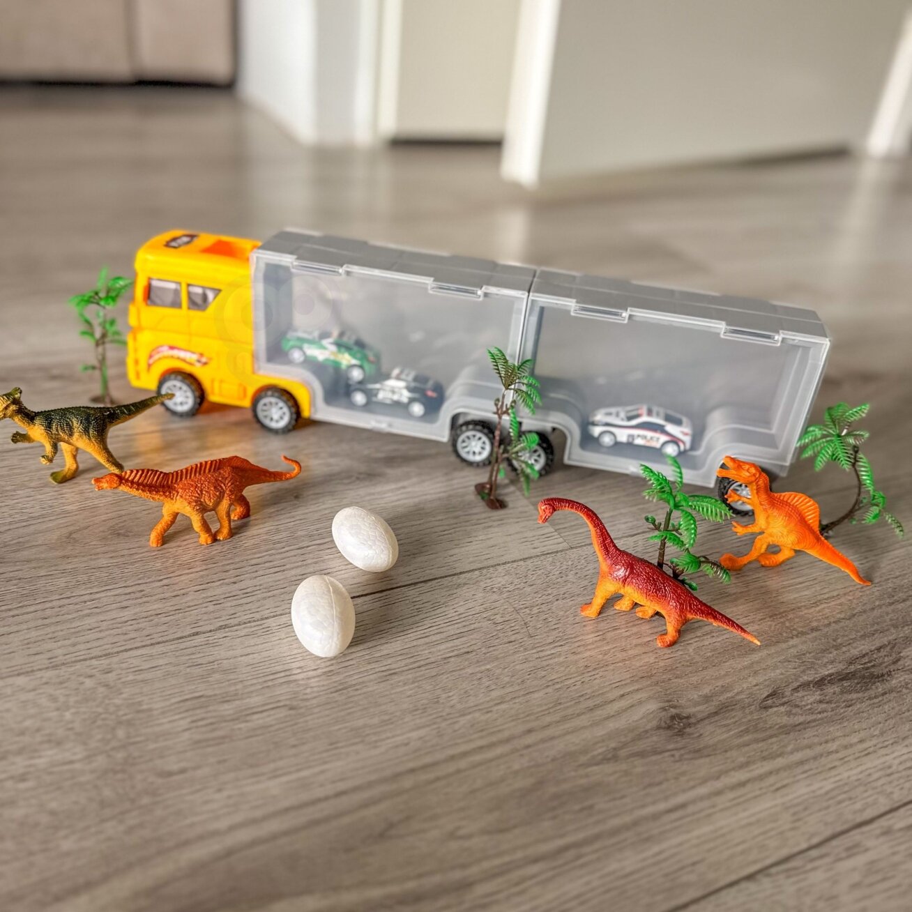 WOOPIE Sunkvežimis-transporteris 2in1 Dinozaurų rinkinys + maketas 1