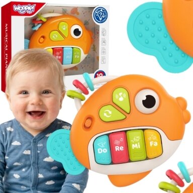 WOOPIE BABY Interaktyvus pianinas Žuvelė Muzikiniai vargonėliai Garsai Šviesa 18m+