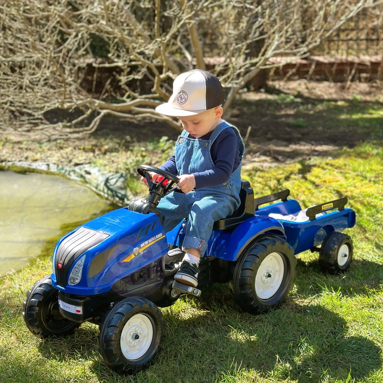 FALK pedalinis traktorius New Holland su priekaba ir atidaromu variklio dangčiu 2–5 m. 5 FALK pedalinis traktorius New Holland su priekaba ir atidaromu variklio dangčiu 2–5 m. 5