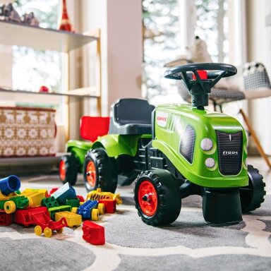 FALK Baby Claas žalias traktoriukas su priekaba + priedai nuo 1 metų