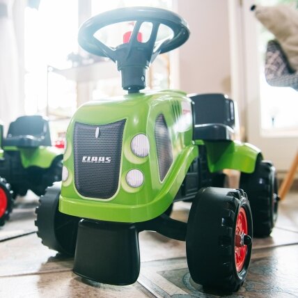 FALK Baby Claas žalias traktoriukas su priekaba + priedai nuo 1 metų 7
