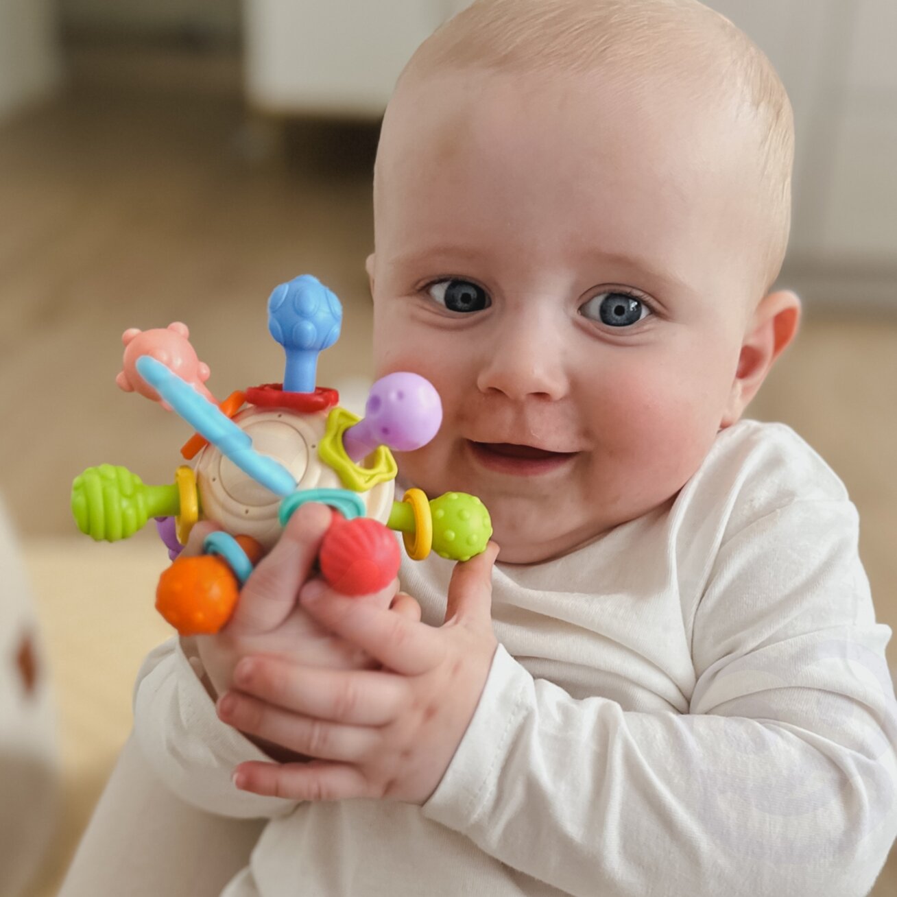 WOOPIE BABY Minkštas barškutis 2in1 kramtukas sensorinis žaislas kūdikiams 0m+ 6 WOOPIE BABY Minkštas barškutis 2in1 kramtukas sensorinis žaislas kūdikiams 0m+ 6