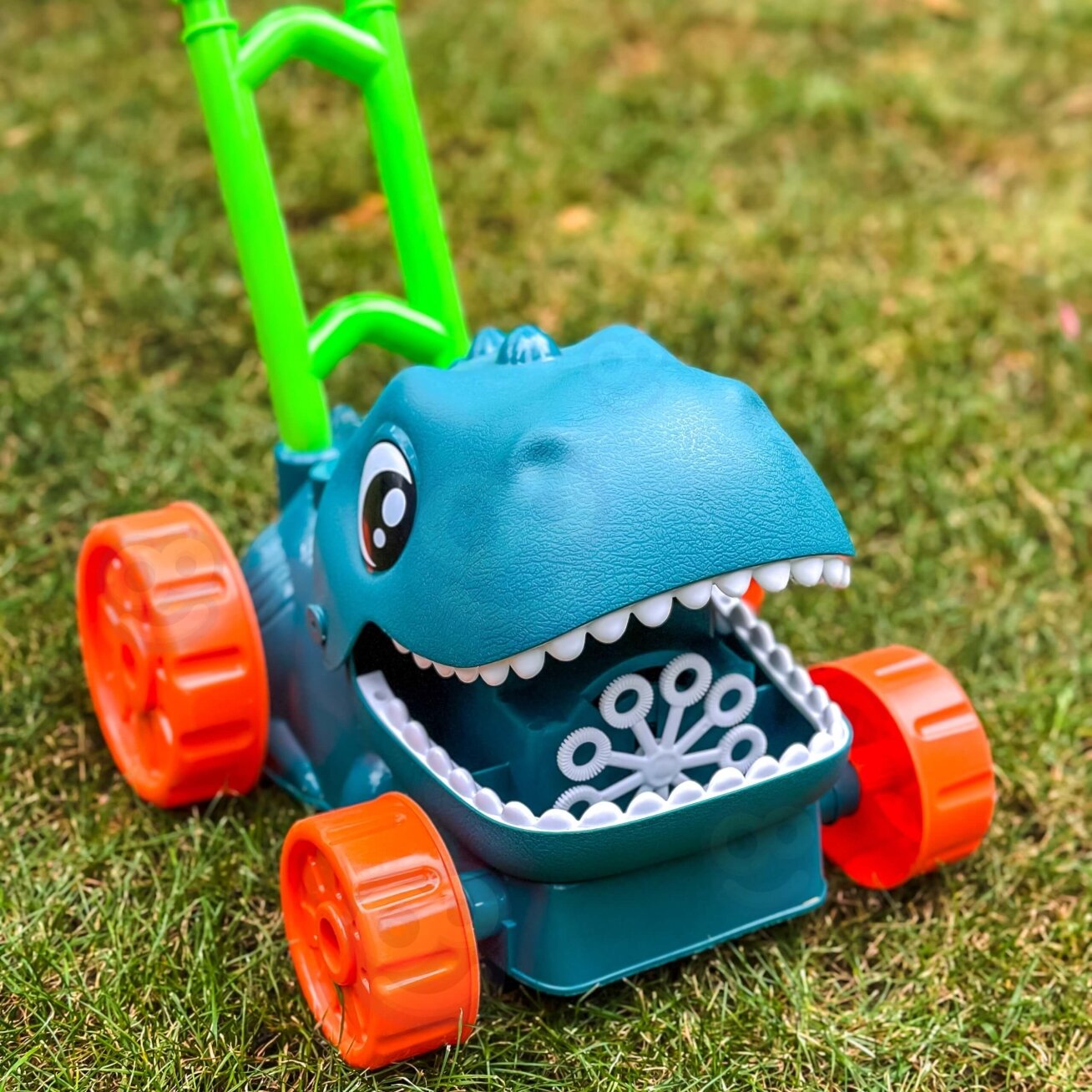 WOOPIE Sodo žoliapjovė Dino muilo burbulams dinozauras + skystis 3 WOOPIE Sodo žoliapjovė Dino muilo burbulams dinozauras + skystis 3